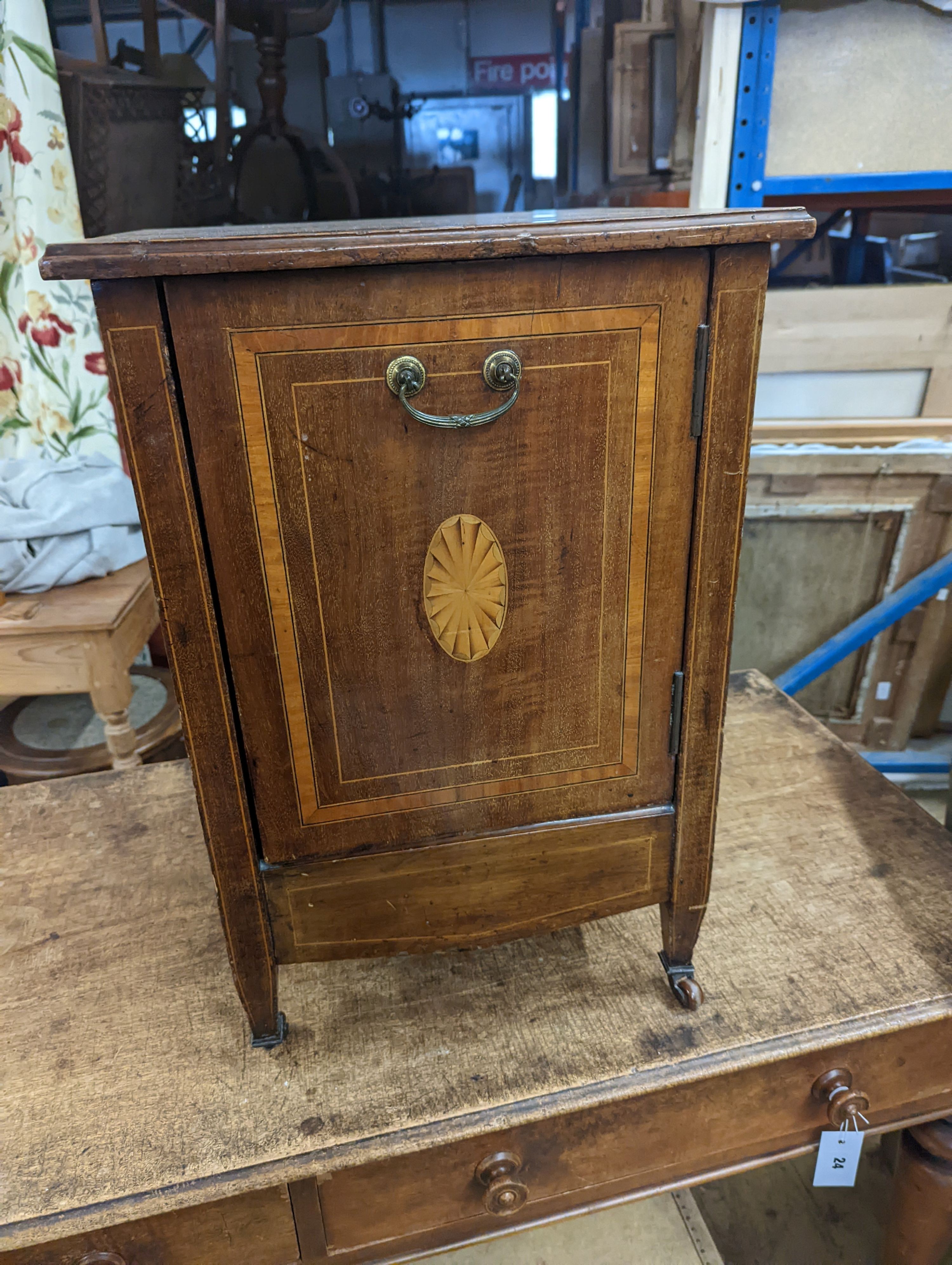 An Edwardian inlaid mahogany bedside cupboard, width 40cm, depth 37cm, height 59cm (altered)